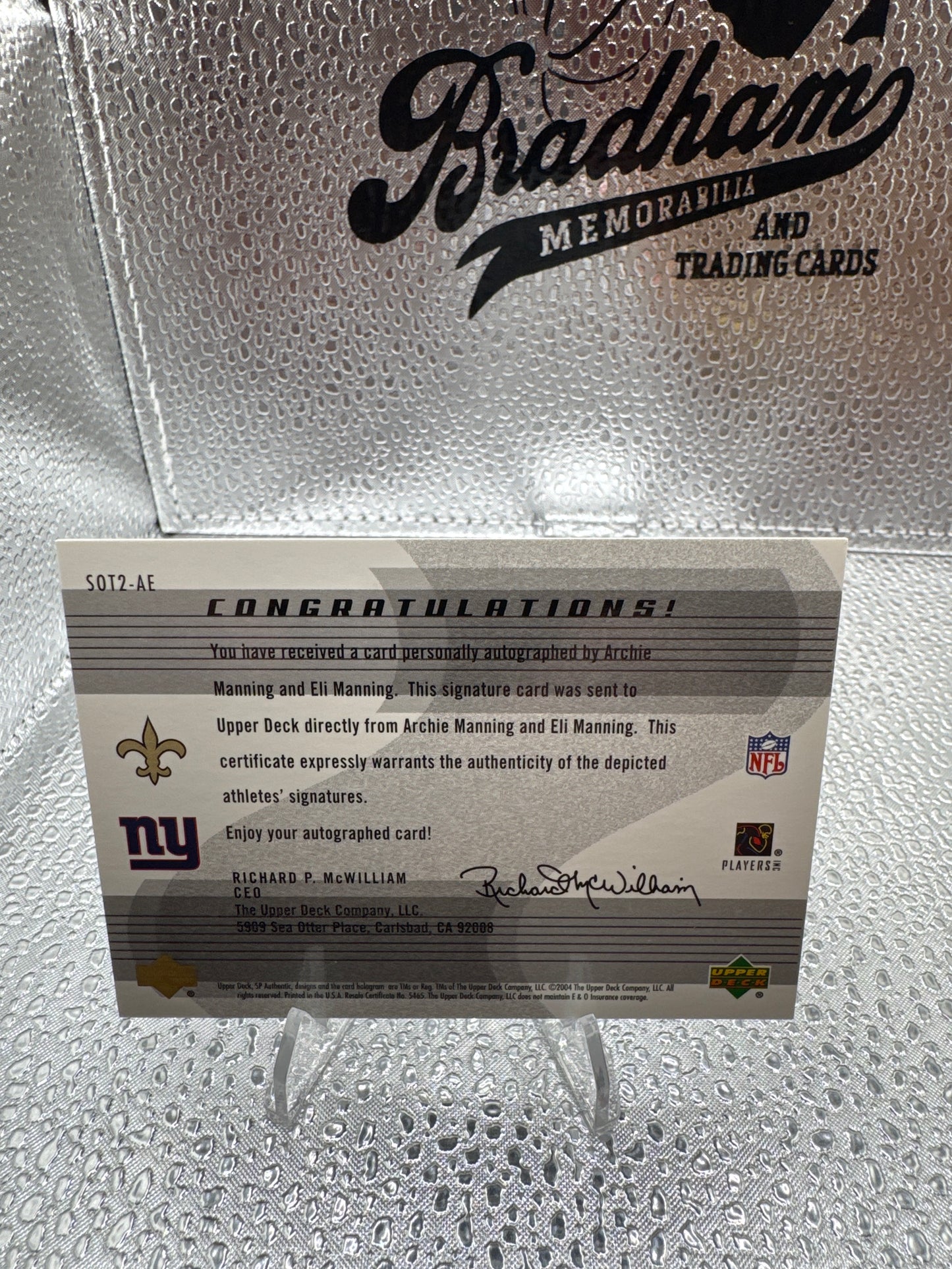 2004 Upper Deck sign of the times dual auto Archie and Eli /50