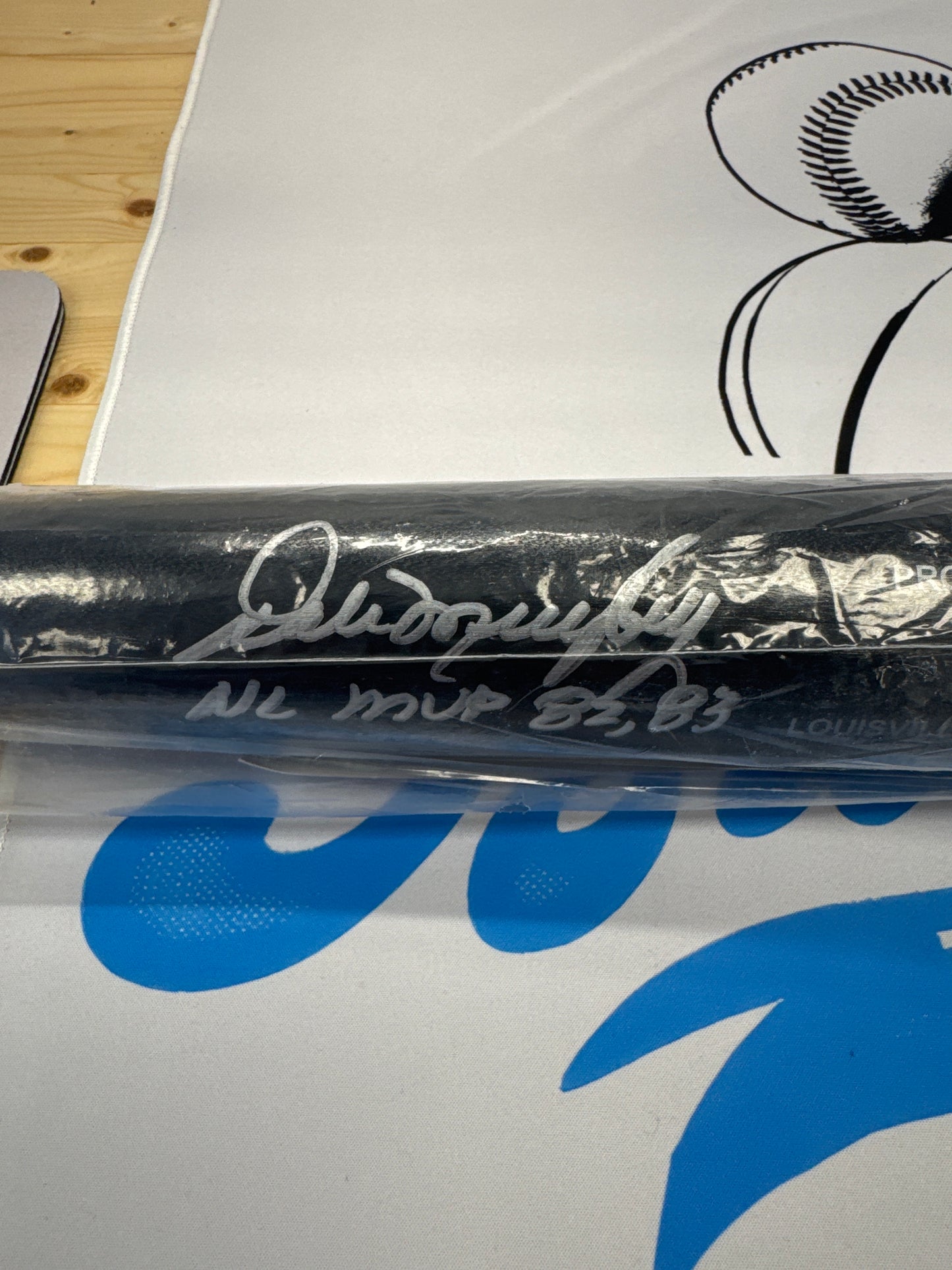 Dale Murphy Autographed bat with COA.   Inscription “NL MVP 82,83