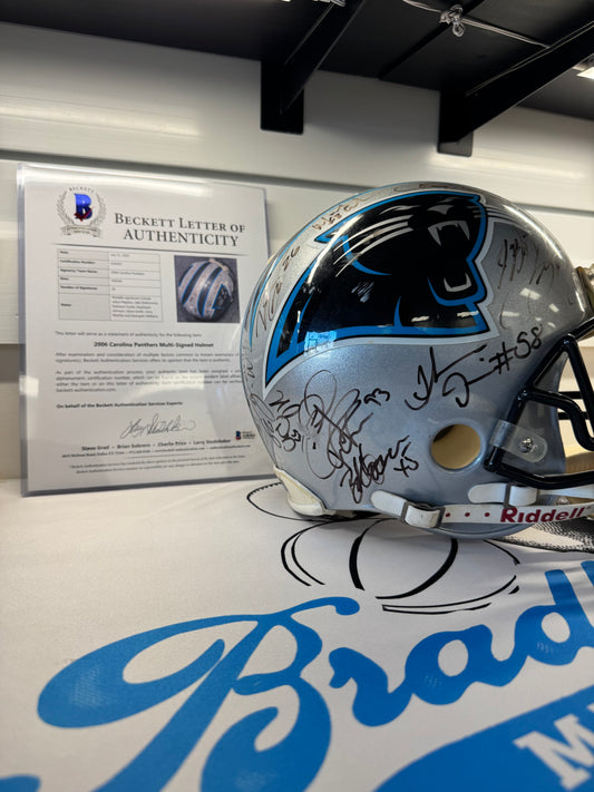 2006 Carolina Panthers Autographed Helmet.  Notable Names. Chris Weinke, Ken Lucas, Julius Peppers, Keyshawn Johnson, Deangelo Williams.   With COA