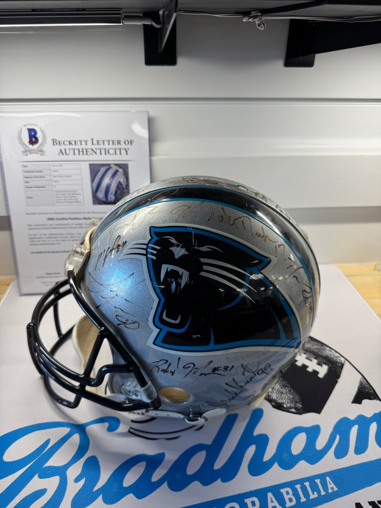2006 Carolina Panthers Autographed Helmet.  Notable Names. Chris Weinke, Ken Lucas, Julius Peppers, Keyshawn Johnson, Deangelo Williams.   With COA